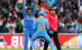 Kuldeep Yadav and Virat Kohli.