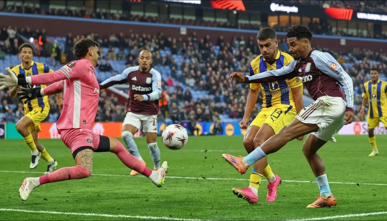Aston Villa's Ian Maatsen scores his side's opening goal