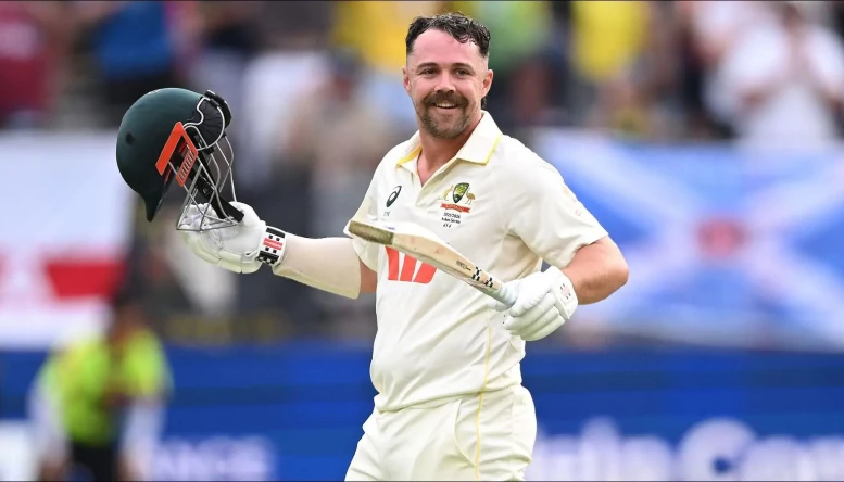 Australian batsman Travis Head reacts after scoring a century 