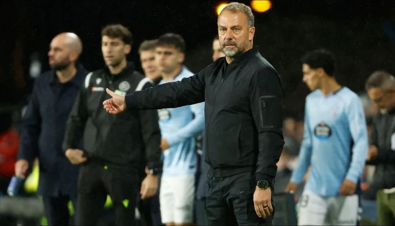 Barcelona's head coach Hansi Flick on the sideline 