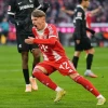Bayern Munich's Lennart Karl celebrates after scoring 