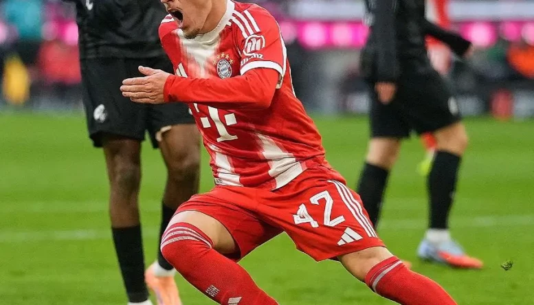 Bayern Munich's Lennart Karl celebrates after scoring 