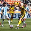 Borussia Dortmund's Daniel Svensson scores