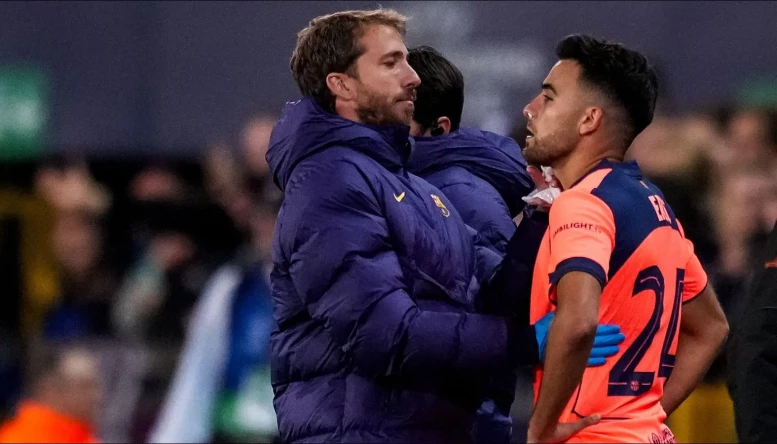 Eric Garcia of FC Barcelona receives medical treatment 