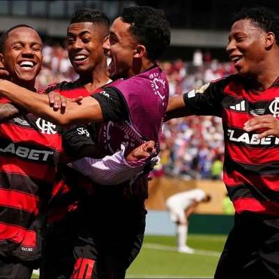 Flamengo's Wallace Yan, left, celebrates after scoring against Chelsea 