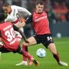 Granit Xhaka of Leverkusen battles for the ball