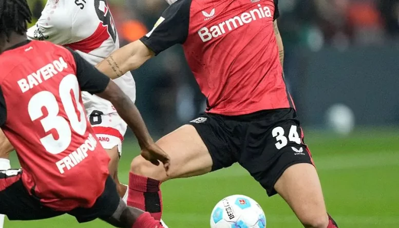 Granit Xhaka of Leverkusen battles for the ball