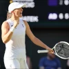 Iga Swiatek of Poland reacts after winning