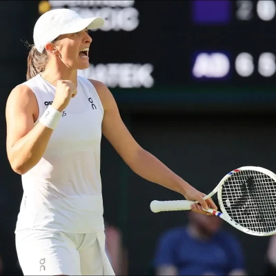 Iga Swiatek of Poland reacts after winning