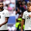 Jonathan Tah and Tom Bischof of Bayern Munich