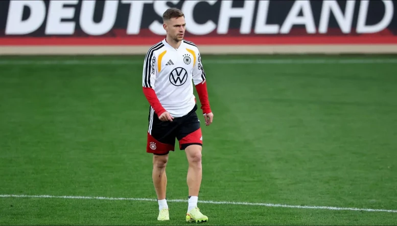 Joshua Kimmich of Germany leaves the field injured 