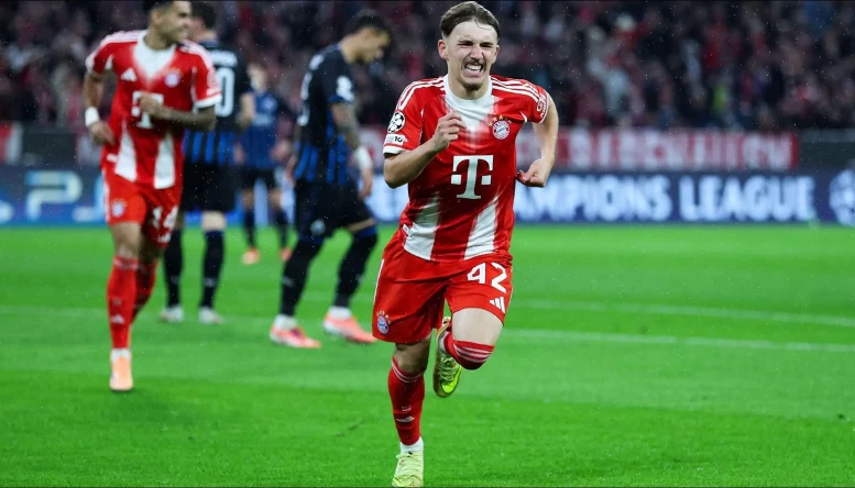Lennart Karl of Bayern Munich celebrates scoring