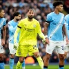 Manchester City goalkeeper Gianluigi Donnarumma with teammates