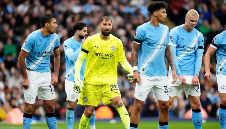 Manchester City goalkeeper Gianluigi Donnarumma with teammates