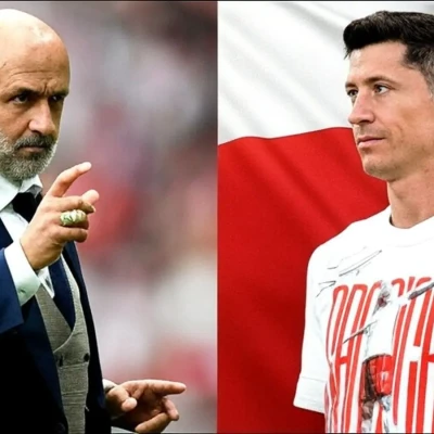 Michal Probierz and Robert Lewandowski of Poland