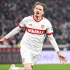 Nick Woltemade celebrates after scoring for Stuttgart