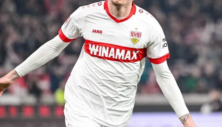 Nick Woltemade celebrates after scoring for Stuttgart