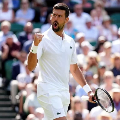 Novak Djokovic reacts after winning 