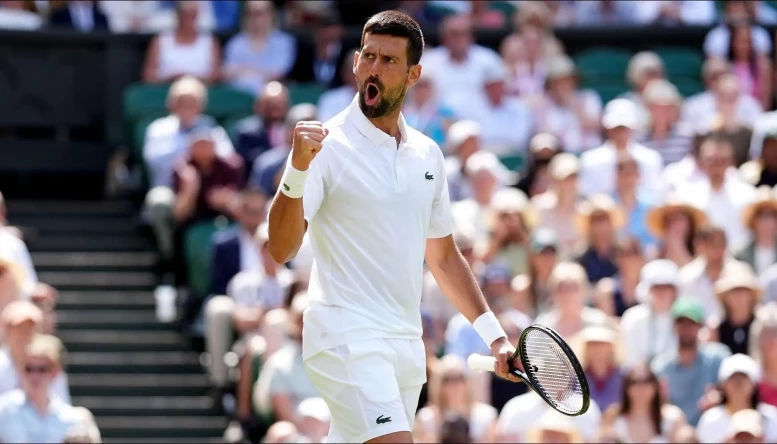 Novak Djokovic reacts after winning