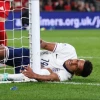 Ollie Watkins of England collides with the post and injures himself 