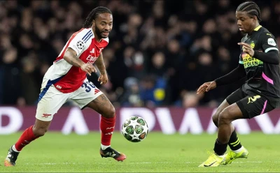 raheem-sterling-of-arsenal-challenges-with-tyrell-malacia-of-psv-eindhoven16.webp