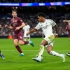 Rodrygo of Real Madrid controls the ball during the Champions League playoff