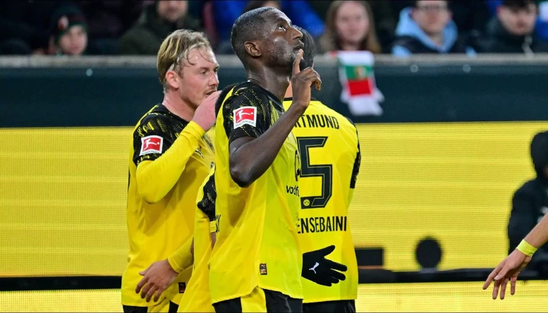 Serhou Guirassy celebrates scoring for Borussia Dortmund