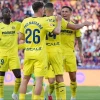 Tajon Buchanan celebrates his Villarreal winner with teammates