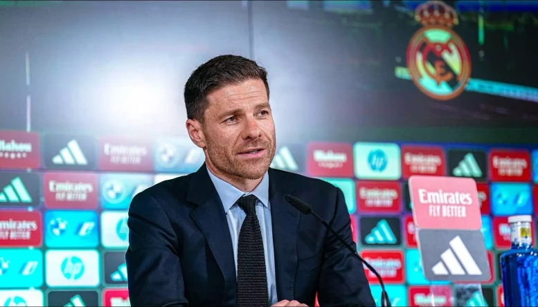 Xabi Alonso speaks to reporters at Real Madrid